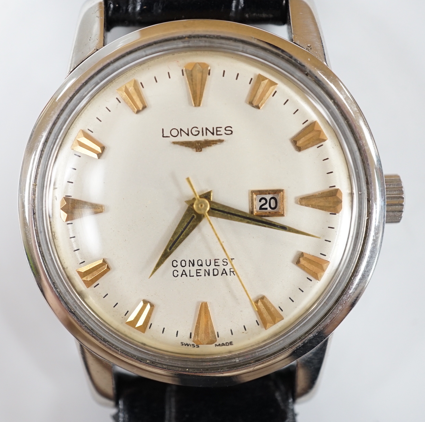 A gentleman's stainless steel Longines Conquest Calendar manual wind wrist watch, on Longines leather strap with Longines buckle, case diameter 35mm.